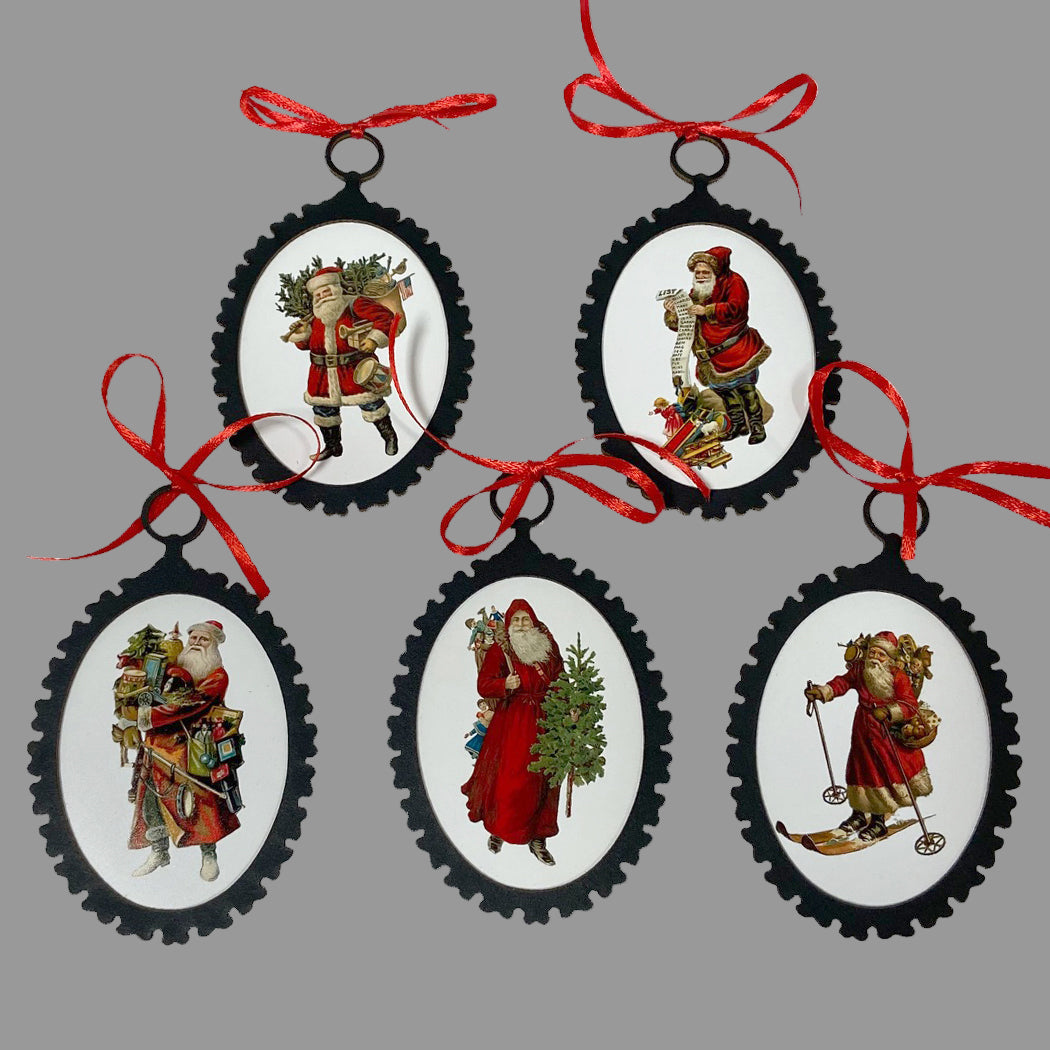 A set of 5 circular Victorian Santa Claus ornaments with red ribbon hangers. Each ornament features a vintage illustration of Santa Claus in a colorful outfit, surrounded by a black matte board border.