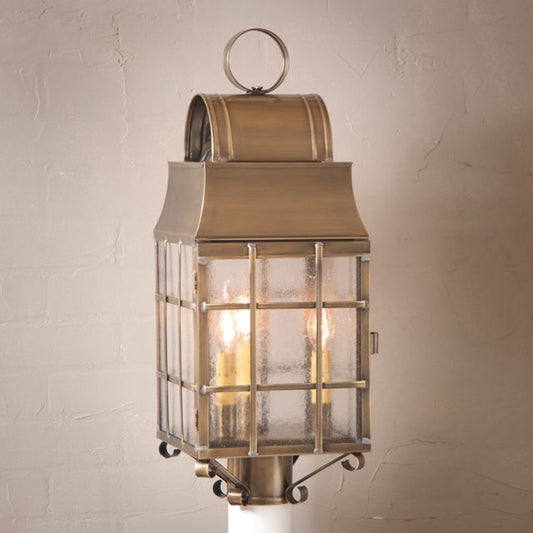 Weathered brass lantern with antique seedy glass and three internal light sockets, designed to fit a 3-inch diameter post.