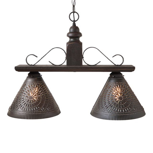 Wooden island pendant light with two punched tin shades in black finish.