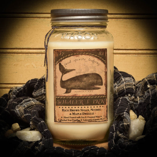Mason jar candle labeled 'Whaler's Inn' with a decorative background