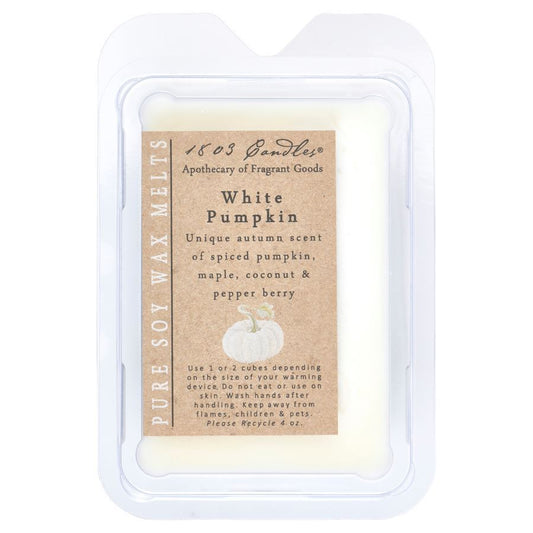 Clear plastic packaging with soy melts labeled "White Pumpkin"
