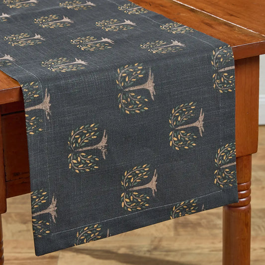 Table runner with tree pattern on a wooden table