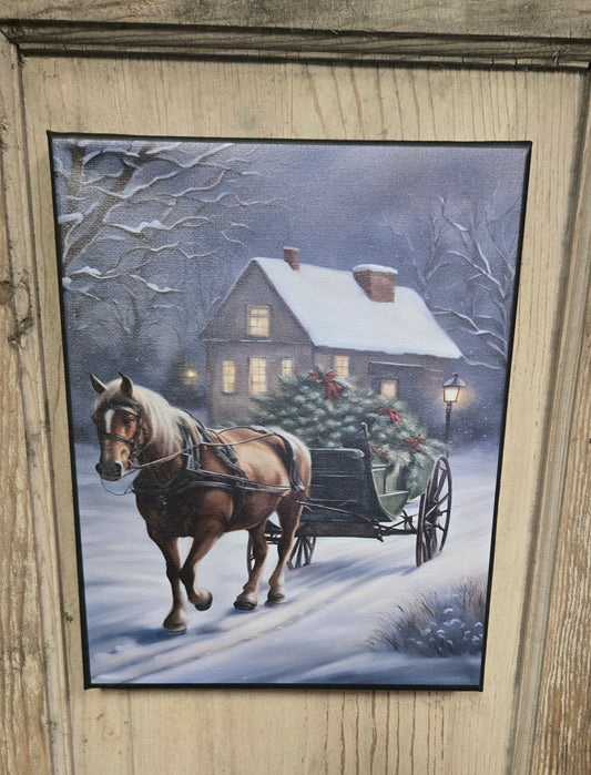 Canvas print of horse pulling cart in a winter scene