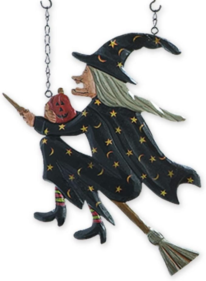 Alternate view of witch on a broomstick facing the other direction.