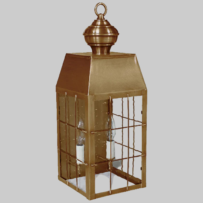 Bronze lantern with glass panels on a white background
