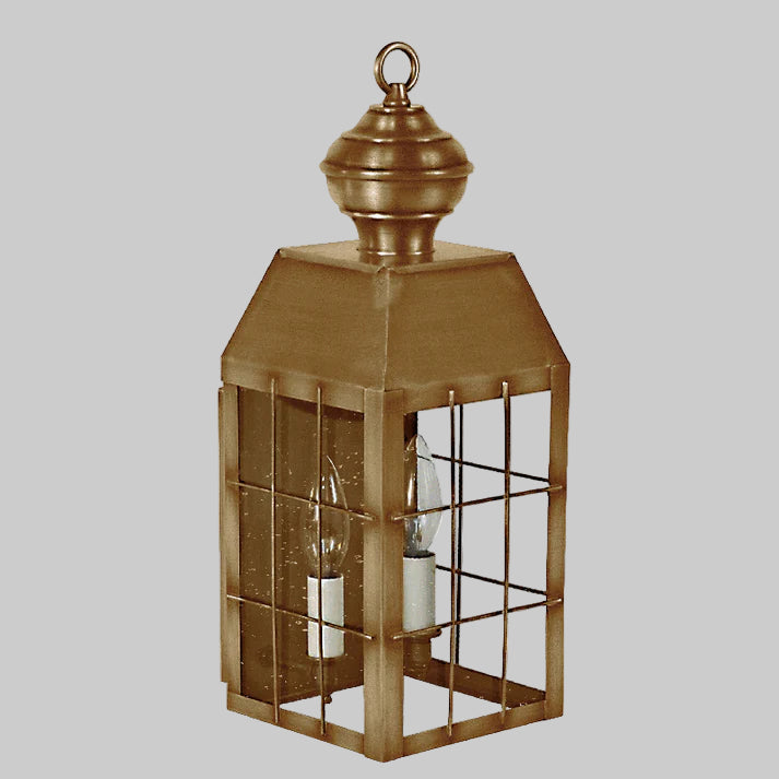 Bronze lantern with glass panels on a white background