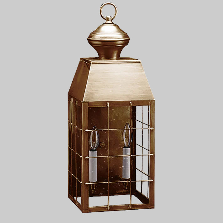 Decorative lantern with a metallic finish on a white background
