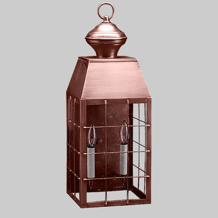 Copper lantern with glass panels on a white background