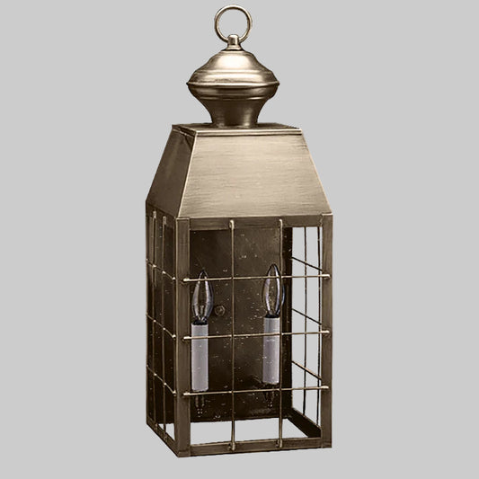 Bronze lantern with glass panels on a white background