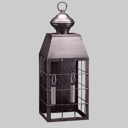 Decorative lantern with a metallic finish on a white background