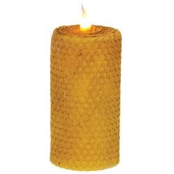 Battery operated pillar with honeycomb texture on a white background.