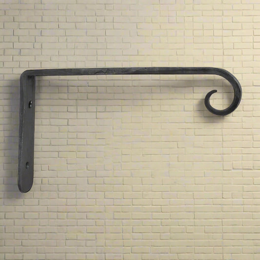 A wrought iron plant hanger with a curved end and a solid gray finish.