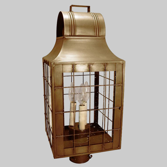 Brass lantern with glass panels on a white background