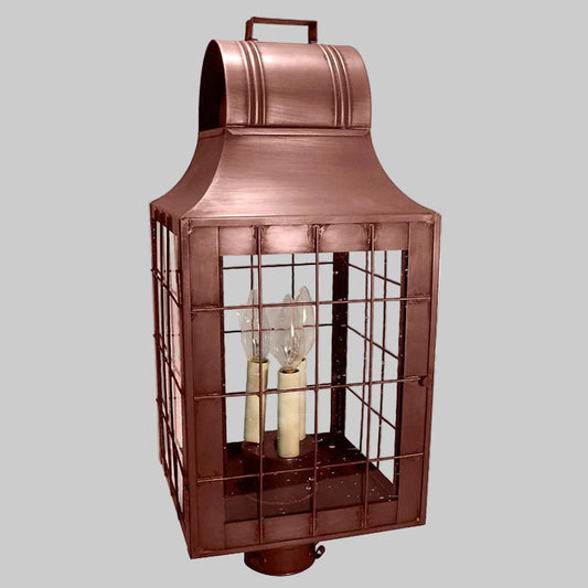 Copper lantern with glass panels on a white background