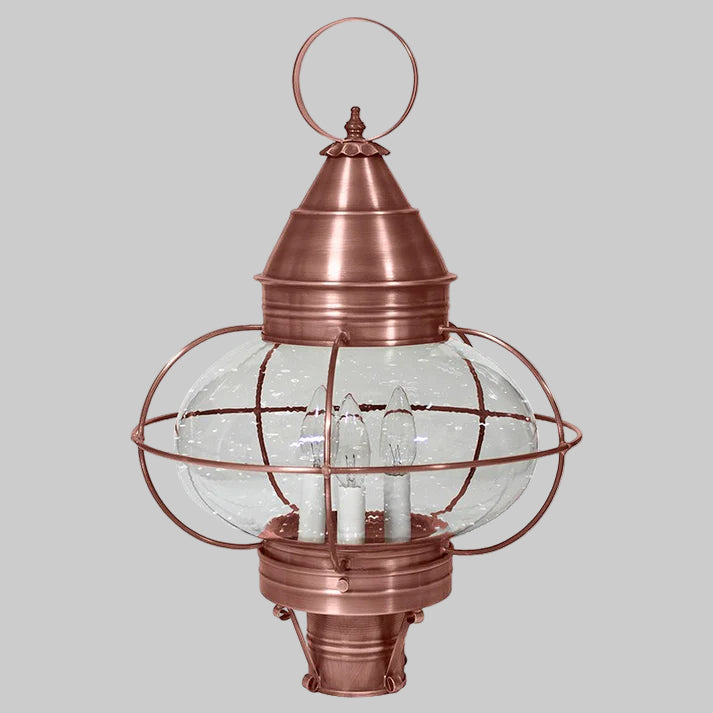 Copper lantern with glass shade on a white background
