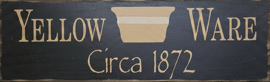 Wooden sign with 'Ware Yellow' and 'Circa 1872' text on a wooden background