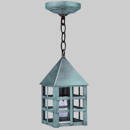 Decorative hanging lantern with a metallic finish on a gray background