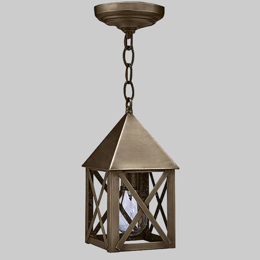 Bronze pendant light fixture on a gray background
