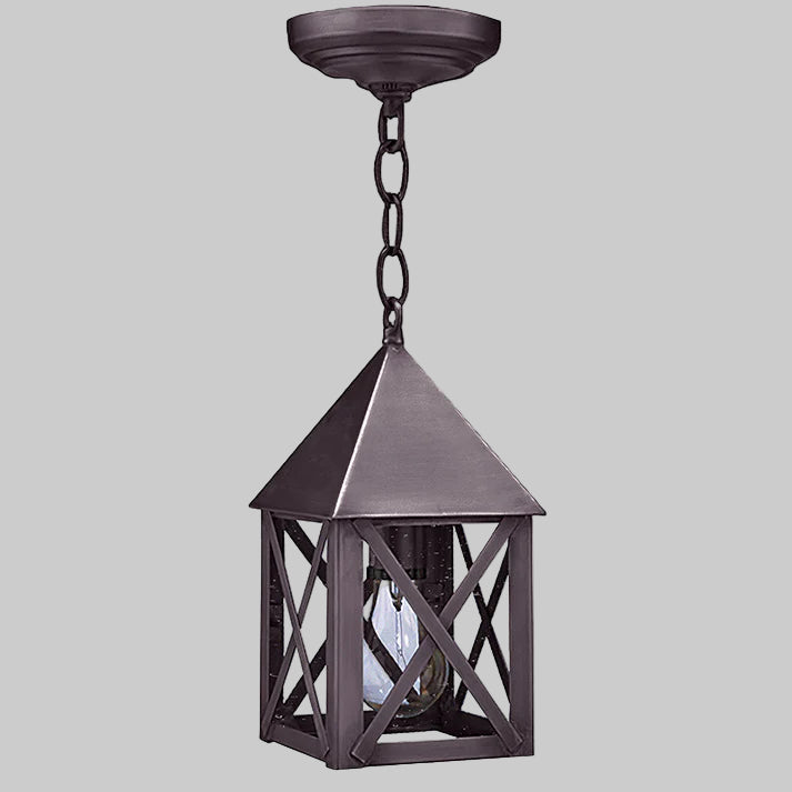 Dark metal outdoor hanging lantern on a gray background