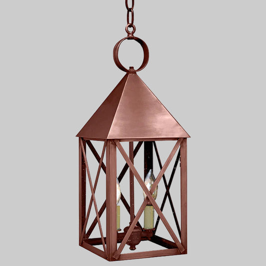 Copper lantern with a gray background