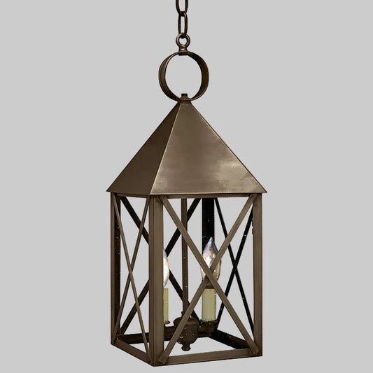 Bronze hanging lantern with crossbar design on a gray background