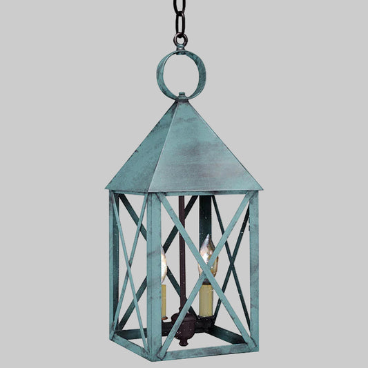 Decorative hanging lantern with a rustic design on a gray background