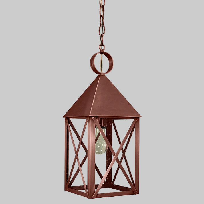 Copper hanging lantern on a gray background