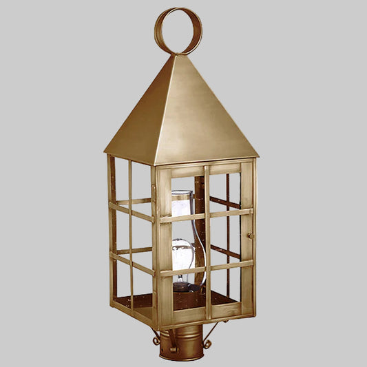Gold lantern with glass panels on a gray background