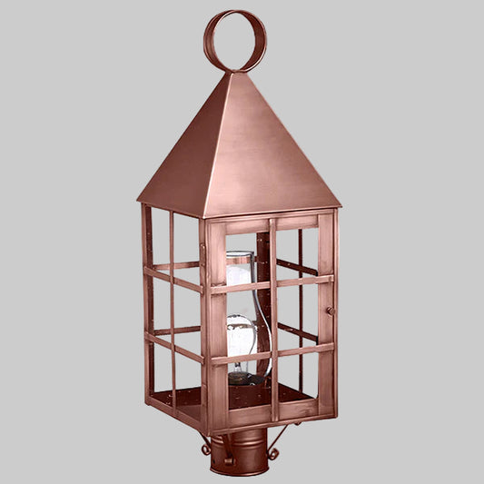 Copper lantern with a gray background