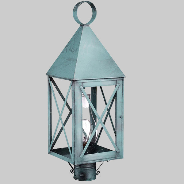 Vintage-style lantern with a metallic finish on a gray background