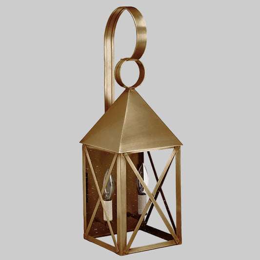 Gold lantern with circular design on a white background