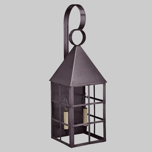 Decorative metal lantern with two candle holders on a white background