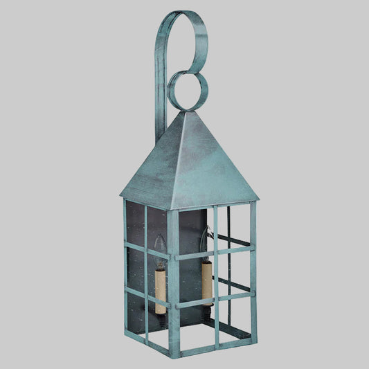Decorative metal lantern with a white background