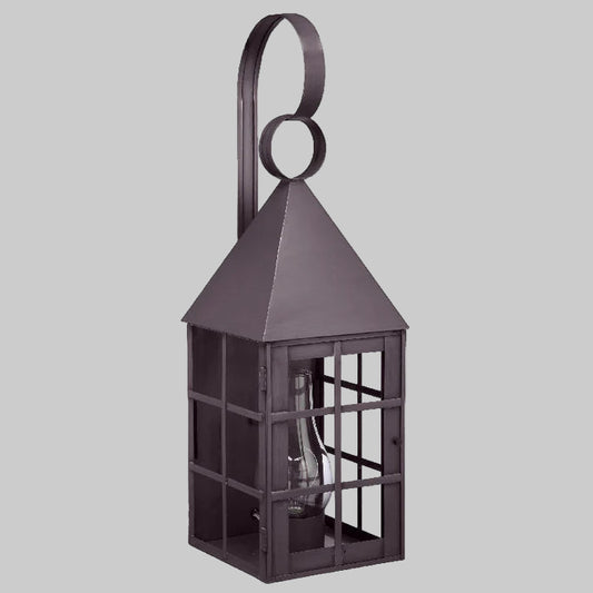 Decorative metal lantern with a grid design on a light gray background