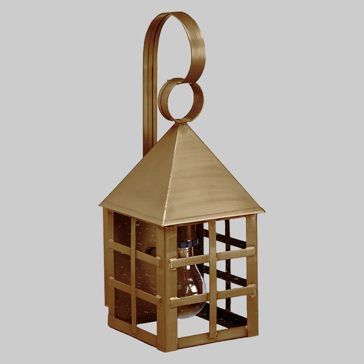 Gold-colored lantern with a handle on a gray background