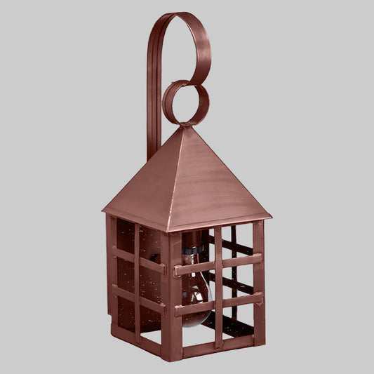 Copper-colored lantern with a handle on a gray background