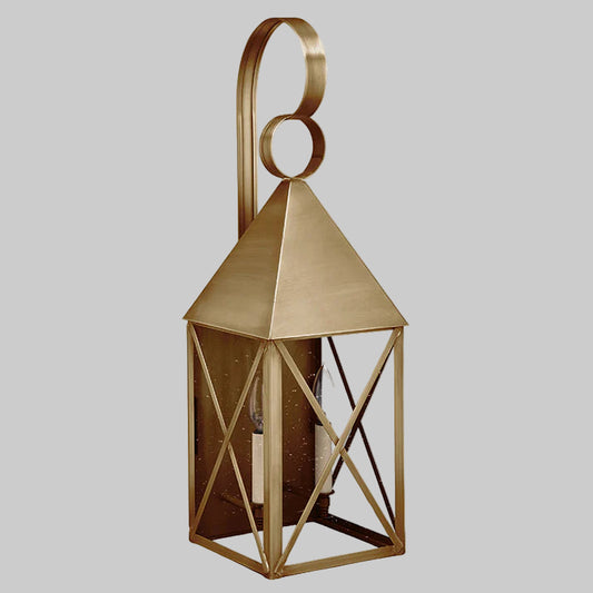 Gold lantern with geometric design on a gray background