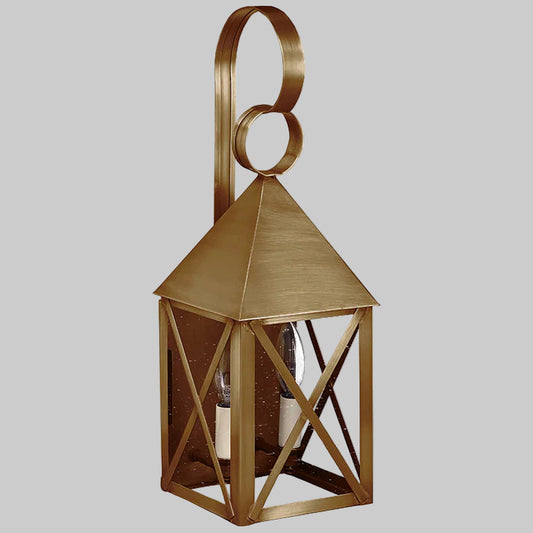 Gold lantern with geometric design on a gray background