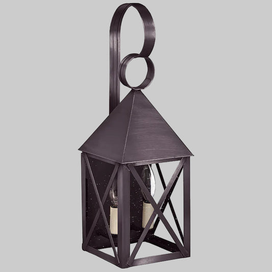 Decorative metal lantern on a gray background